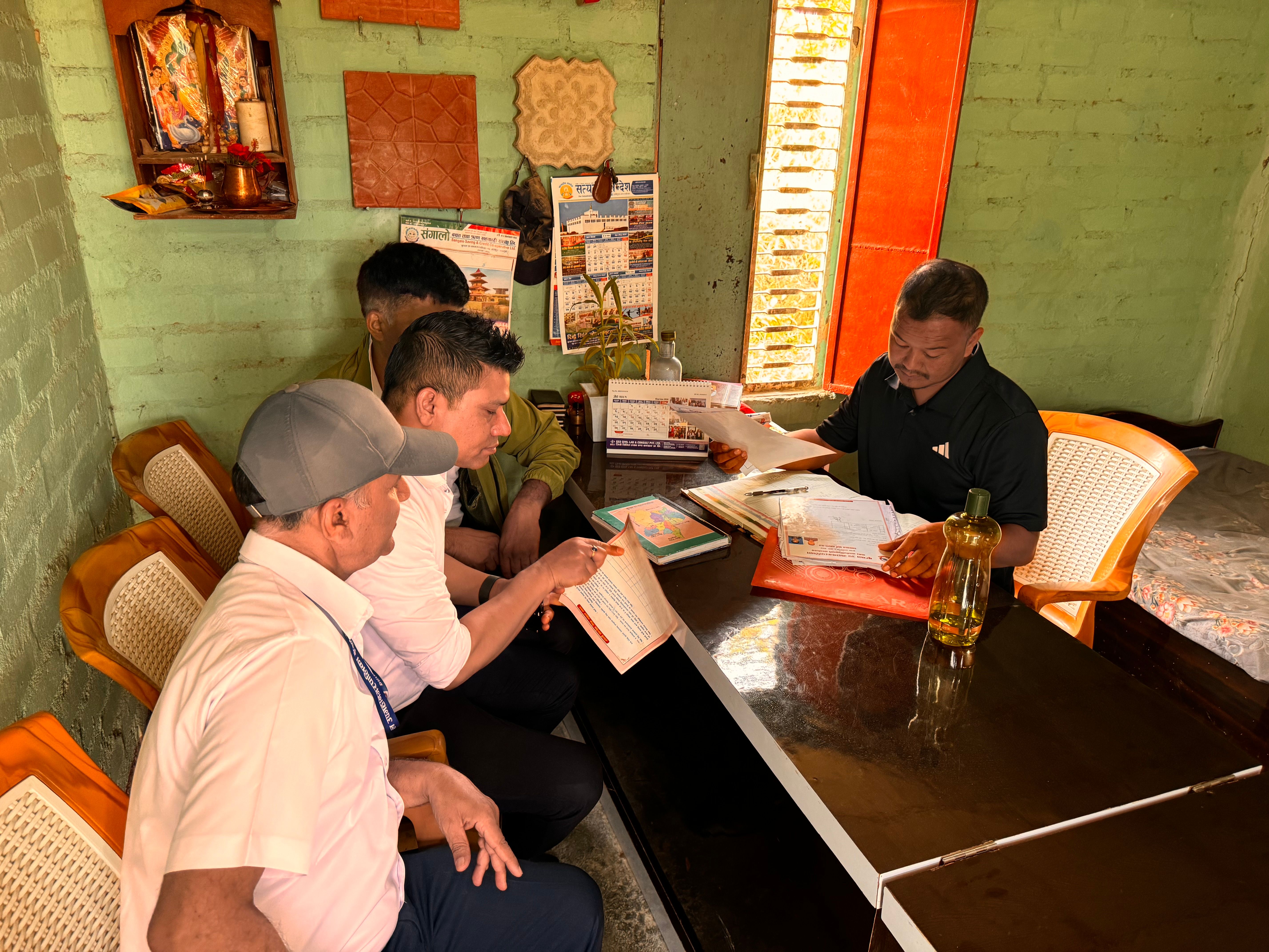 Business team planning with documents and calendars on a desk, illustrating a contractor content calendar.